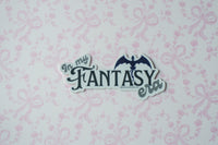 A die-cut sticker with the text 'In my FANTASY era' and a bat silhouette, shown on a white background with a light pink bow pattern.